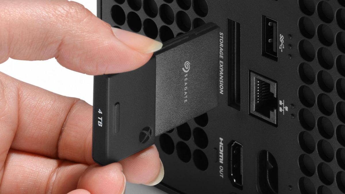 Image showing a person using Seagate 4TB Xbox Expansion card.